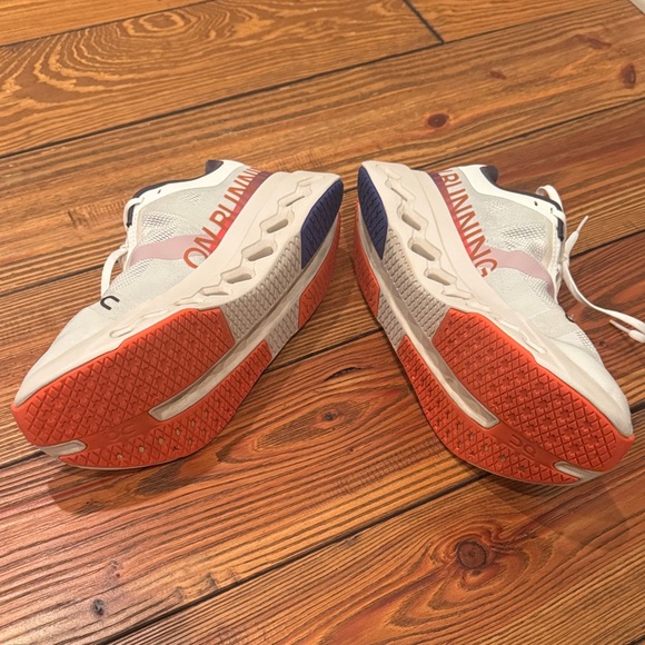 On Running White and Black Sneakers with Orange Detail - Picture 3 of 6